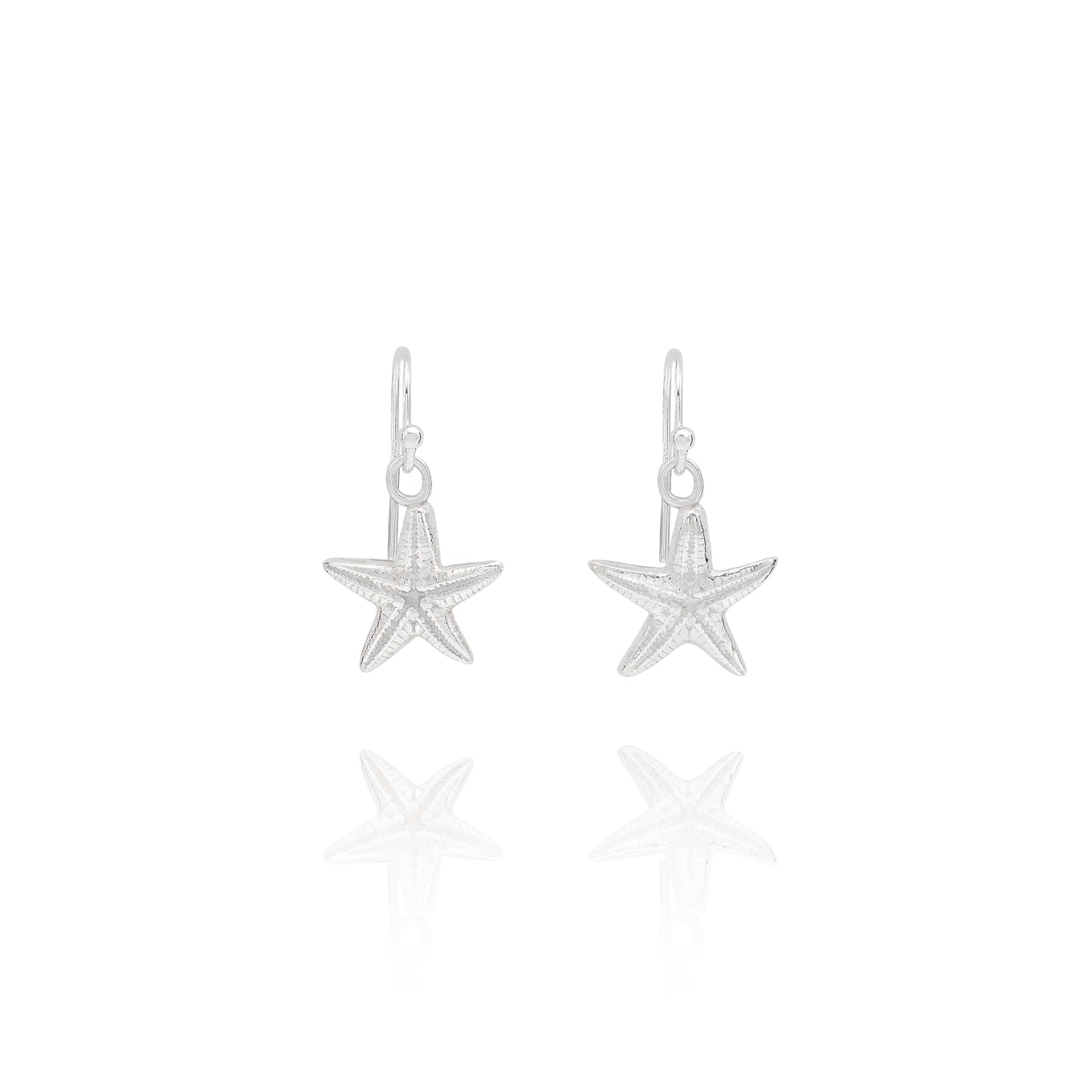 Handmade recycled silver starfish earrings by Iris and Lolli, ocean inspired jewellery crafted in the UK on white background