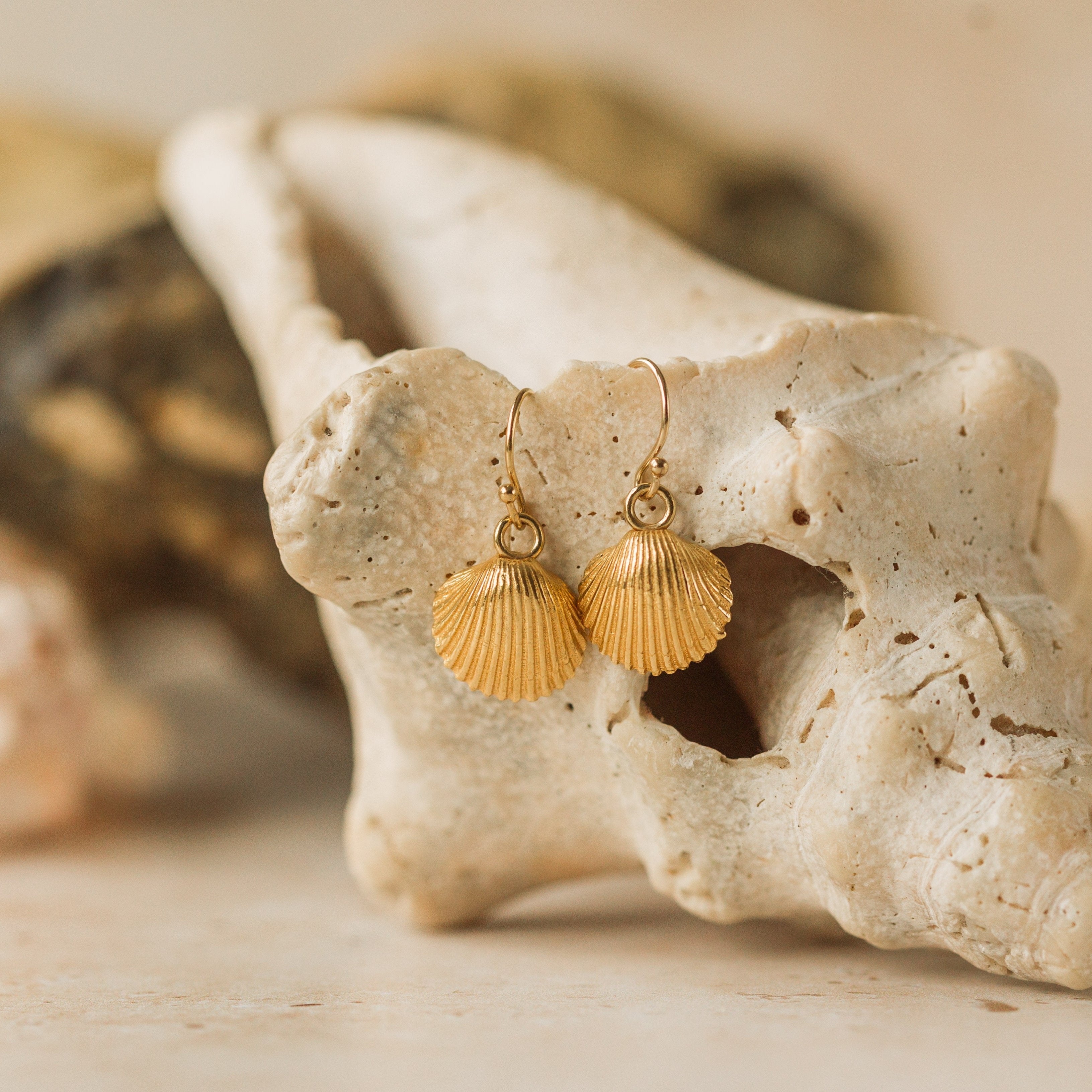 Gold shell earrings, part of the gold earrings collection - handmade in the UK by Iris and Lolli Jewellery 