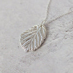Silver blackberry leaf necklace pendant, cast from a real leaf in recycled silver.