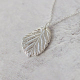 Silver blackberry leaf necklace pendant, cast from a real leaf in recycled silver.