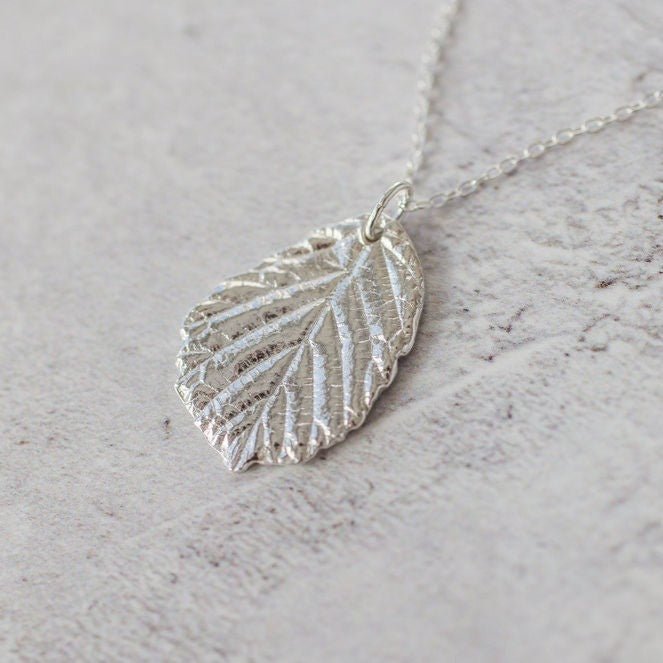 Silver blackberry leaf necklace pendant, cast from a real leaf in recycled silver.