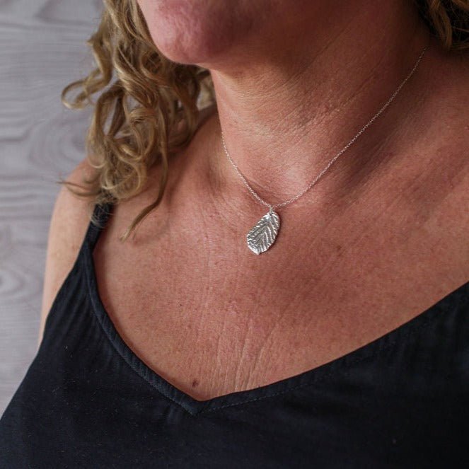 Silver blackberry leaf necklace pendant, cast from a real leaf in recycled silver.