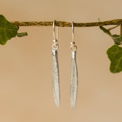 Model wearing Silver Rosemary Leaf Earrings (3)