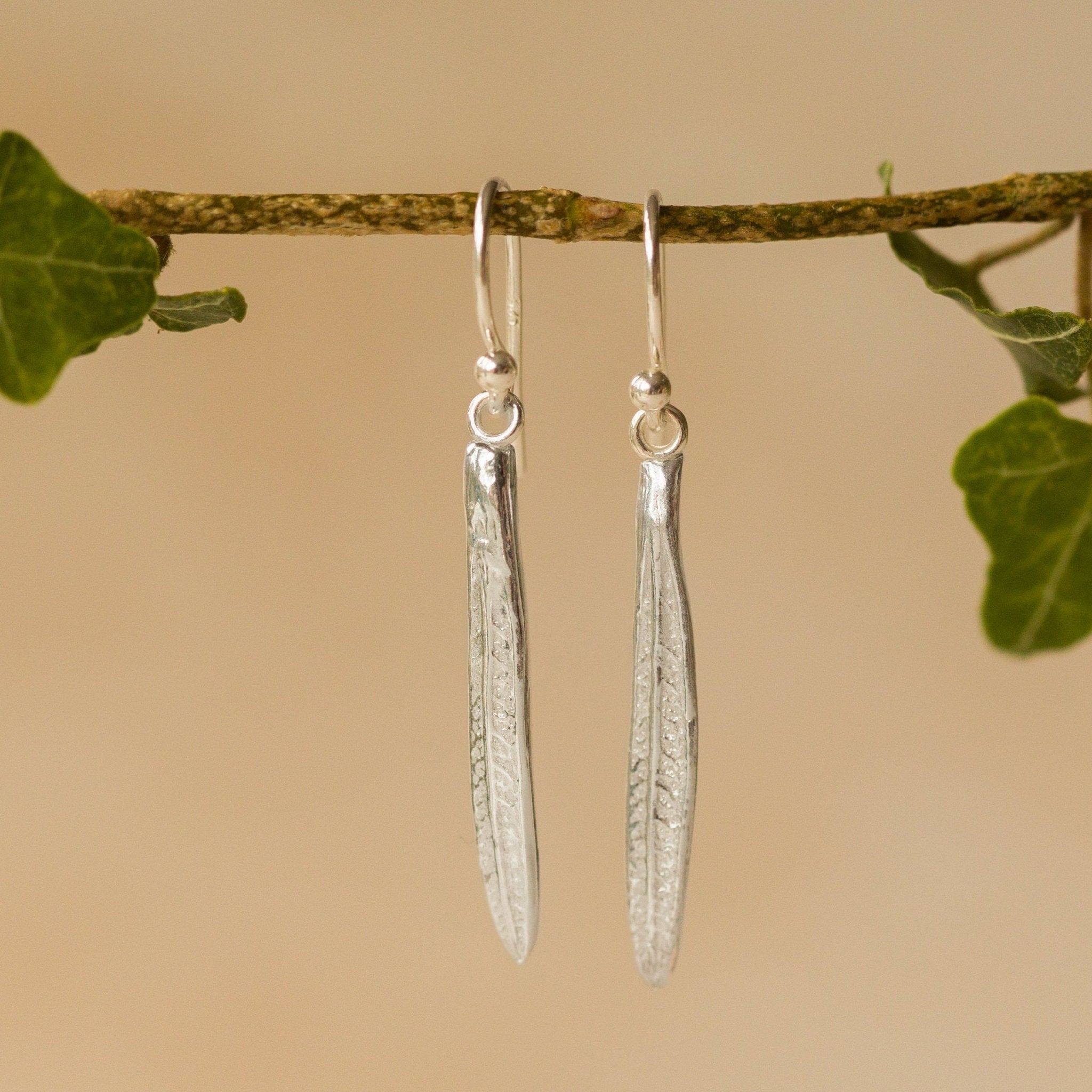 Model wearing Silver Rosemary Leaf Earrings (3)