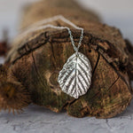 Silver blackberry leaf necklace pendant, cast from a real leaf in recycled silver.