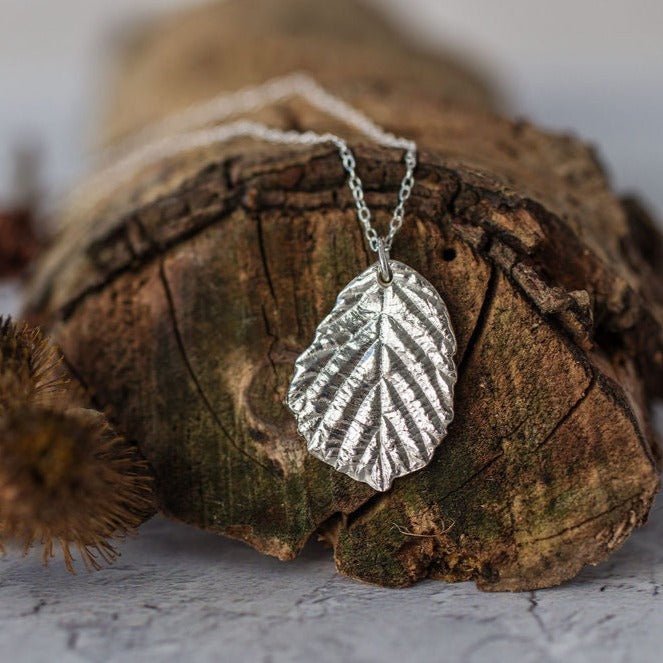 Silver blackberry leaf necklace pendant, cast from a real leaf in recycled silver.