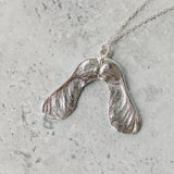 Handmade silver sycamore seed necklace