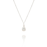 Silver necklace with a pendant on a white background