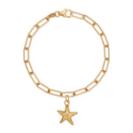 gold vermeil starfish charm bracelet with paperclip chain on white background, handcrafted coastal design by Iris & Lolli