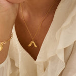 Model wearing Gold Baby Sycamore Necklace (1)