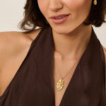 Model wearing Iris & Lolli Gold Oak Leaf Necklace with matching Gold Oak Leaf Earrings handcrafted from recycled silver with 18ct gold vermeil finish