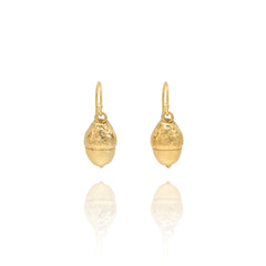 Handmade recycled gold acorn drop earrings by Iris and Lolli on white background, woodland inspired and crafted in the UK