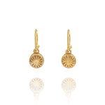 Handmade recycled gold round poppy seed head drop earrings by Iris and Lolli on white background, botanical inspired and crafted in the UK