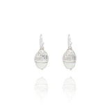 Handmade recycled silver acorn drop earrings by Iris and Lolli on white background, woodland inspired and crafted in the UK