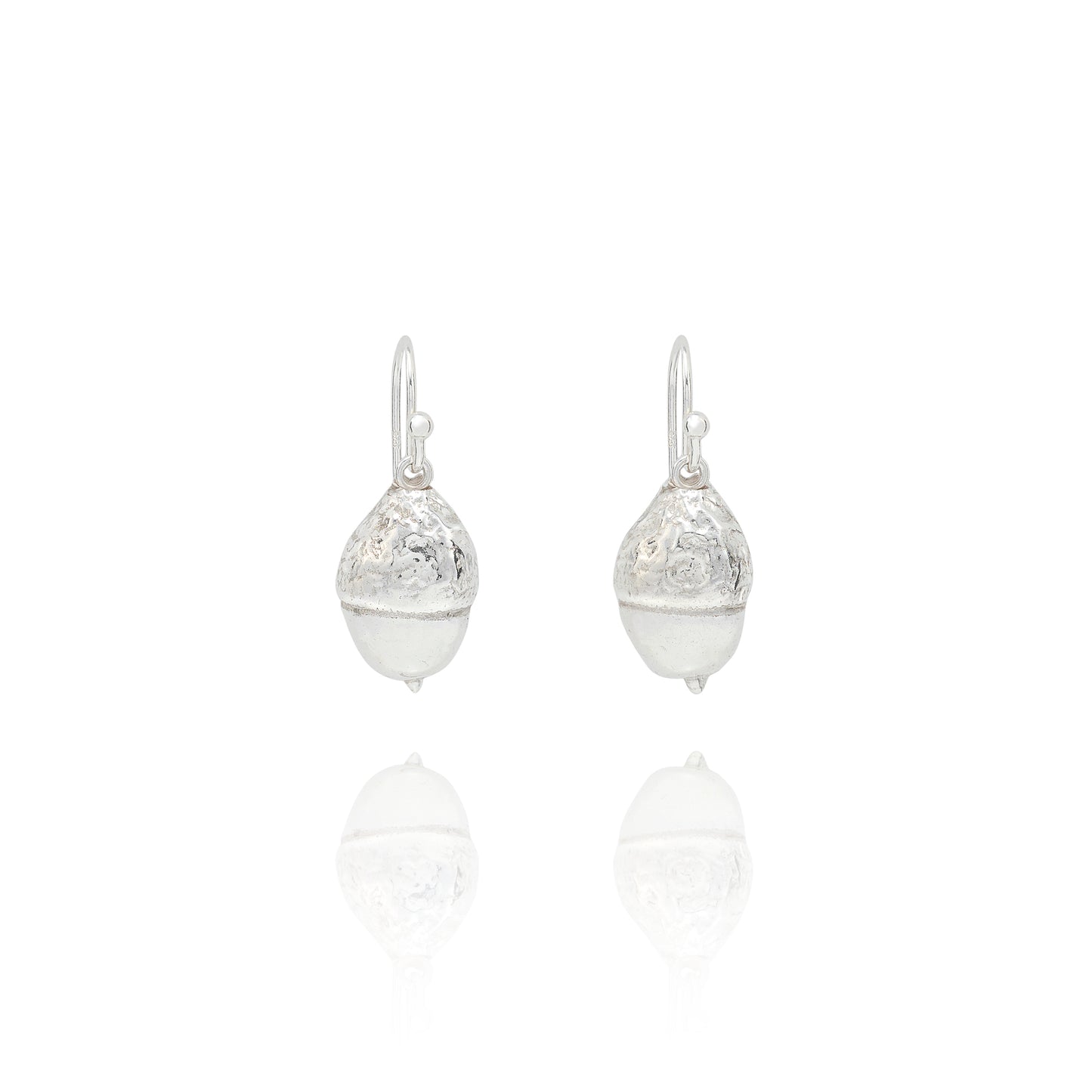 Handmade recycled silver acorn drop earrings by Iris and Lolli on white background, woodland inspired and crafted in the UK