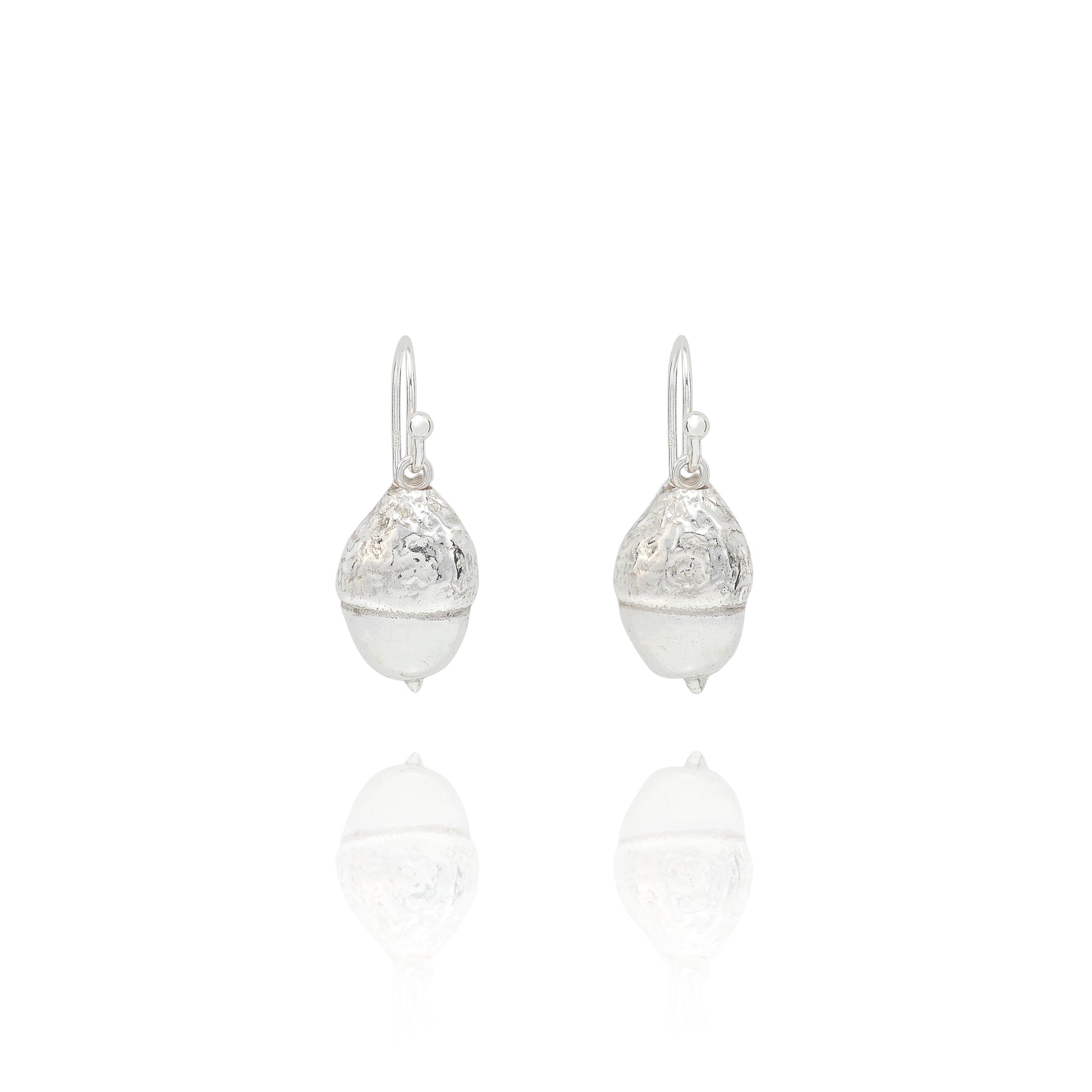 Handmade recycled silver acorn drop earrings by Iris and Lolli on white background, woodland inspired and crafted in the UK