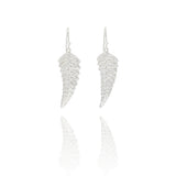 Handmade recycled silver fern leaf drop earrings by Iris and Lolli on white background, nature inspired and crafted in the UK