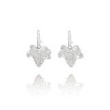 Handmade recycled silver ivy leaf drop earrings by Iris and Lolli on white background, nature inspired and crafted in the UK