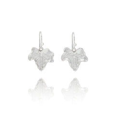Handmade recycled silver ivy leaf drop earrings by Iris and Lolli on white background, nature inspired and crafted in the UK