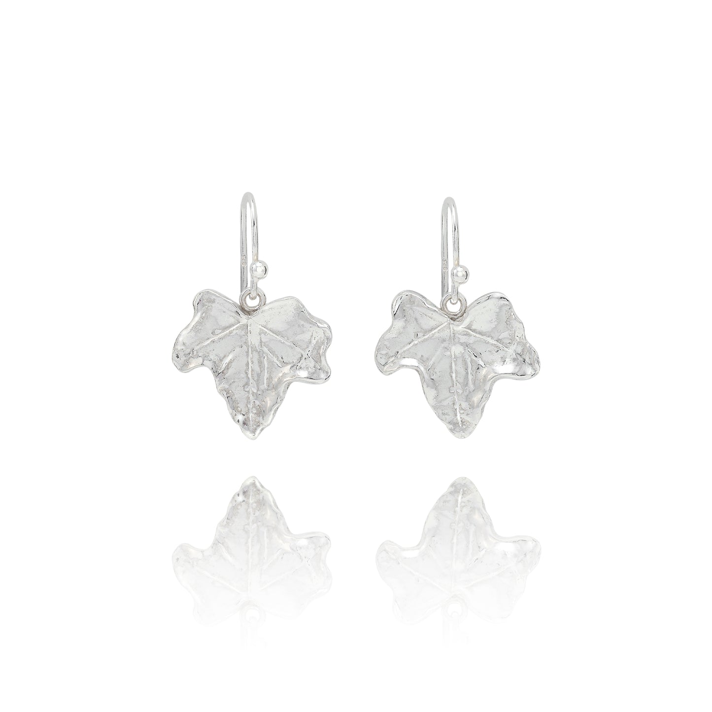 Handmade recycled silver ivy leaf drop earrings by Iris and Lolli on white background, nature inspired and crafted in the UK
