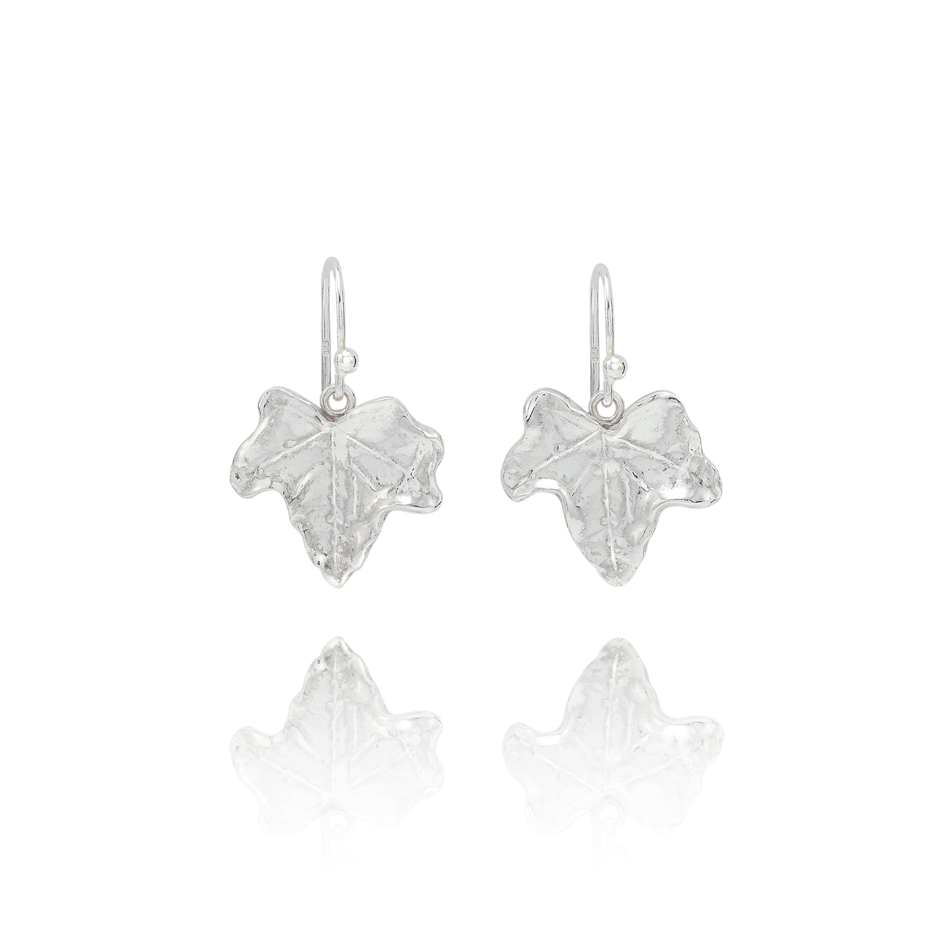 Handmade recycled silver ivy leaf drop earrings by Iris and Lolli on white background, nature inspired and crafted in the UK