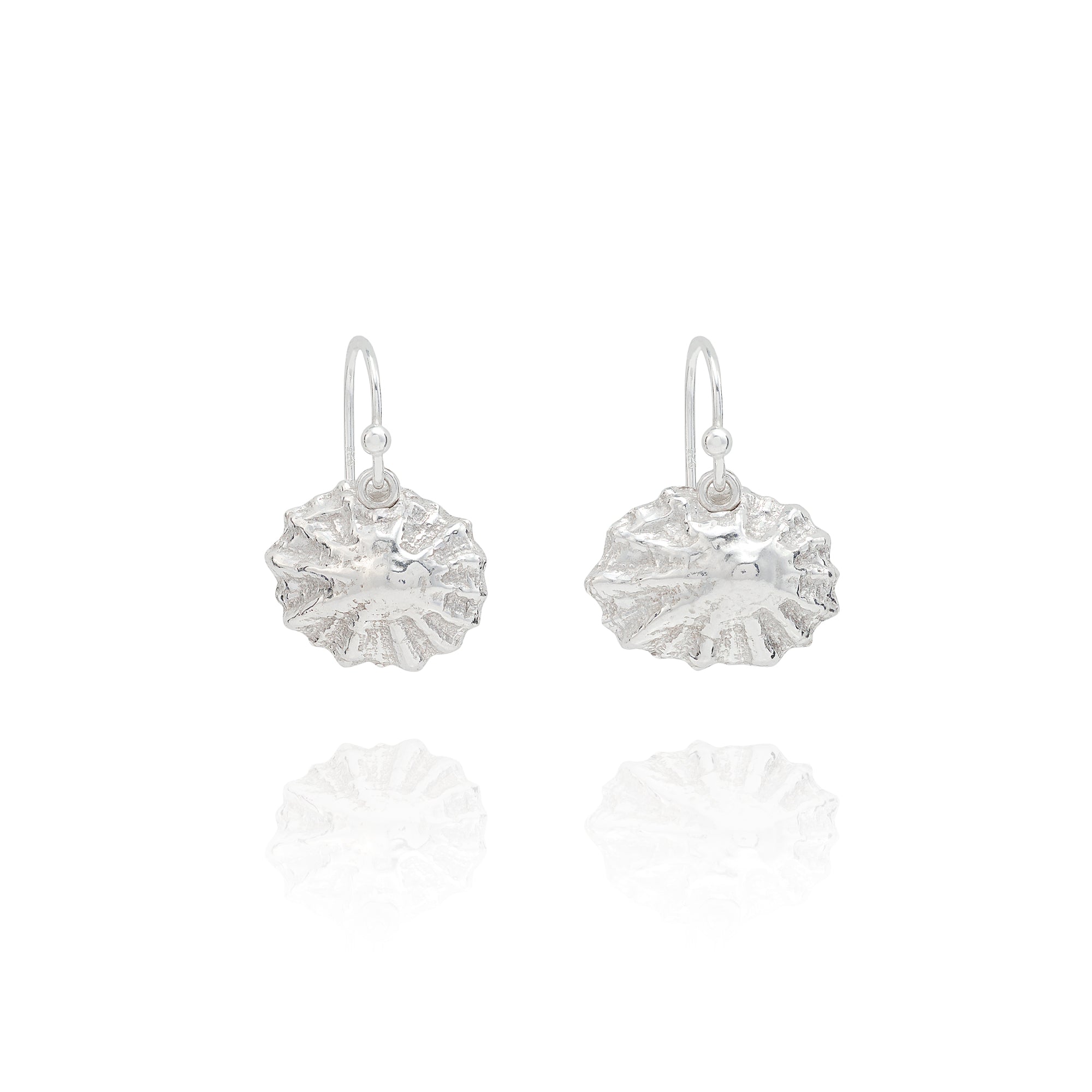 Handmade recycled silver limpet shell drop earrings by Iris and Lolli on white background, inspired by coastal shells and crafted in the UK