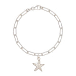 recycled silver starfish charm bracelet with paperclip chain, handcrafted sustainable jewellery by Iris & Lolli on white background
