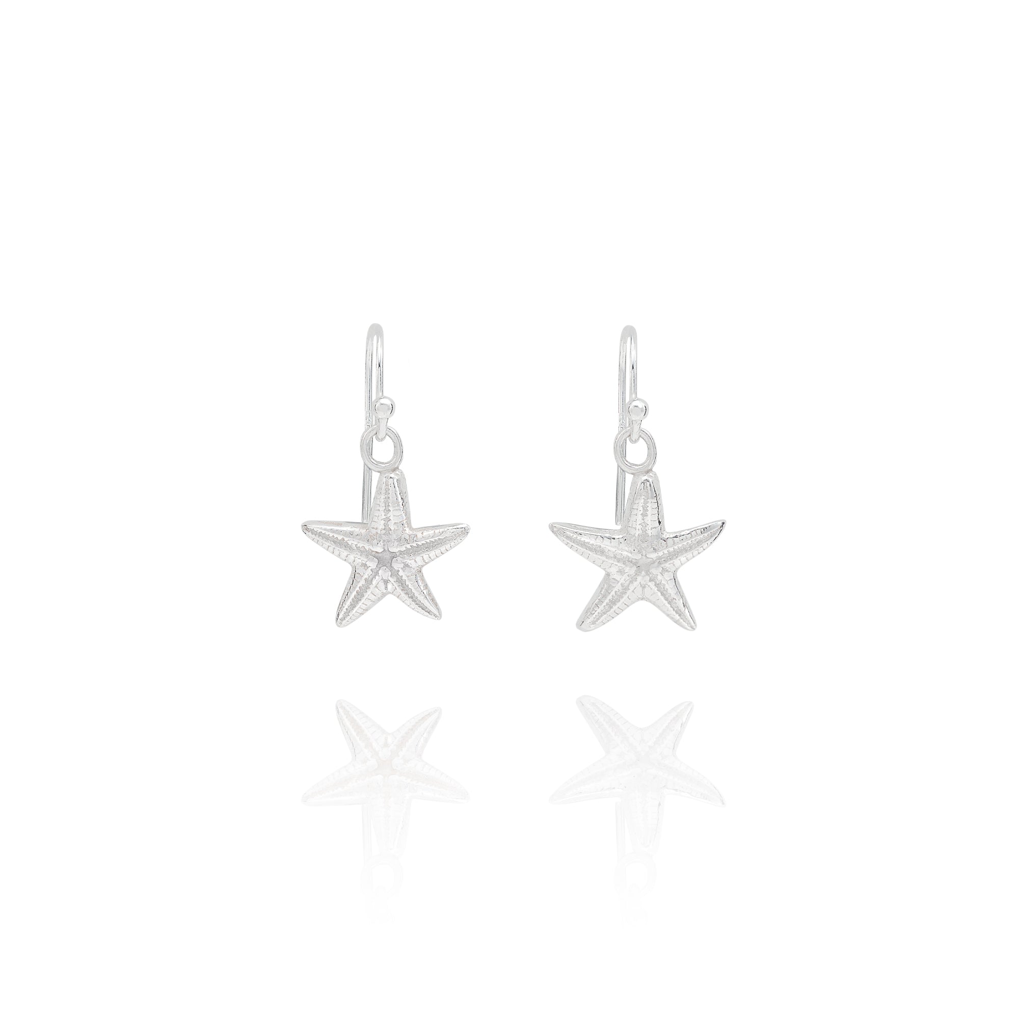 Handmade recycled silver starfish earrings by Iris and Lolli, ocean inspired jewellery crafted in the UK on white background