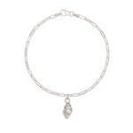 recycled silver whelk shell charm bracelet with fine paperclip chain on white background by Iris & Lolli