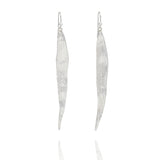 Handmade recycled silver willow leaf drop earrings by Iris and Lolli on white background, nature inspired and crafted in the UK