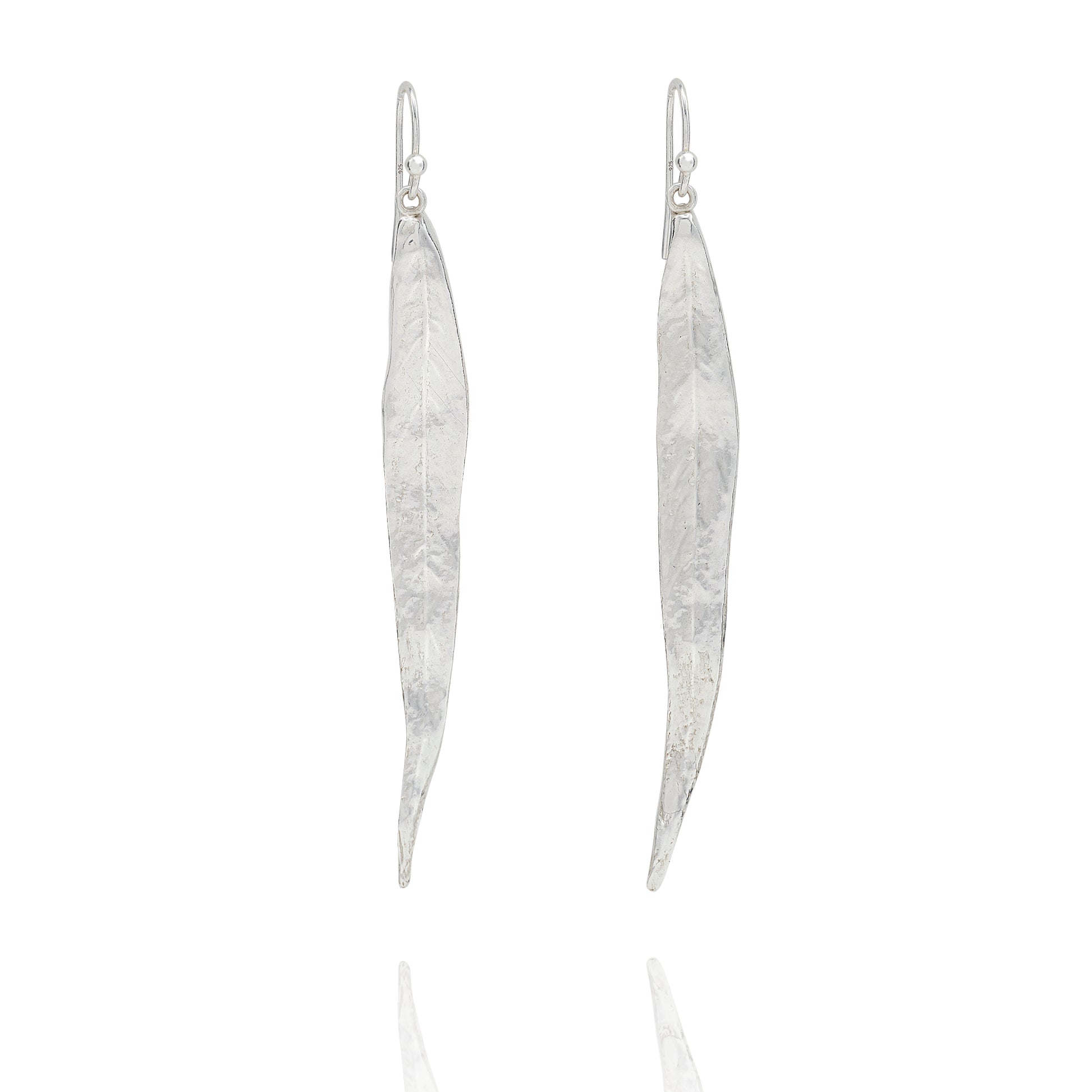 Handmade recycled silver willow leaf drop earrings by Iris and Lolli on white background, nature inspired and crafted in the UK