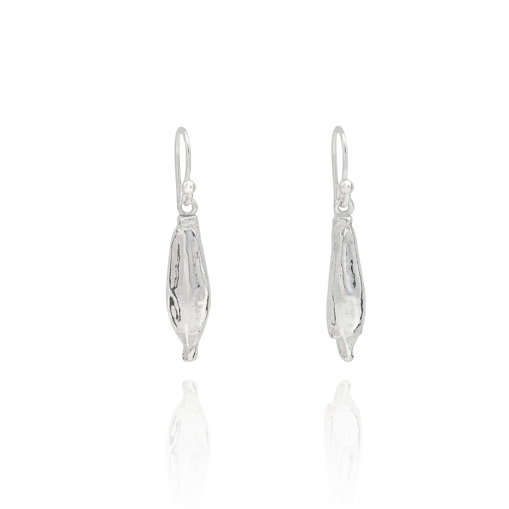 Handmade recycled silver Yellow Poppy Seed earrings by Iris and Lolli, nature inspired botanical drop earrings crafted in the UK on white background