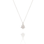 fine silver forget me not flower pendant necklace displayed on white background, delicate floral jewellery design