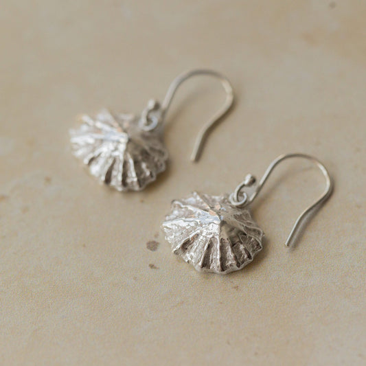 Handmade recycled silver limpet shell drop earrings inspired by the sea, crafted in the UK by Iris and Lolli