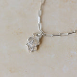 silver oak leaf charm bracelet with paperclip chain on neutral stone background, handcrafted recycled silver jewellery by Iris & Lolli