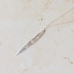 Handcrafted silver willow leaf necklace made in the UK from recycled silver. A nature-inspired pendant with organic texture, perfect for gifting and everyday wear.