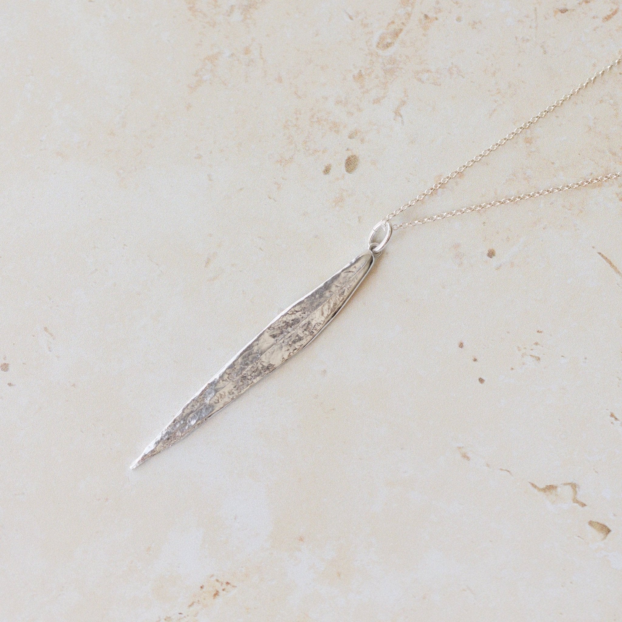 Handcrafted silver willow leaf necklace made in the UK from recycled silver. A nature-inspired pendant with organic texture, perfect for gifting and everyday wear.