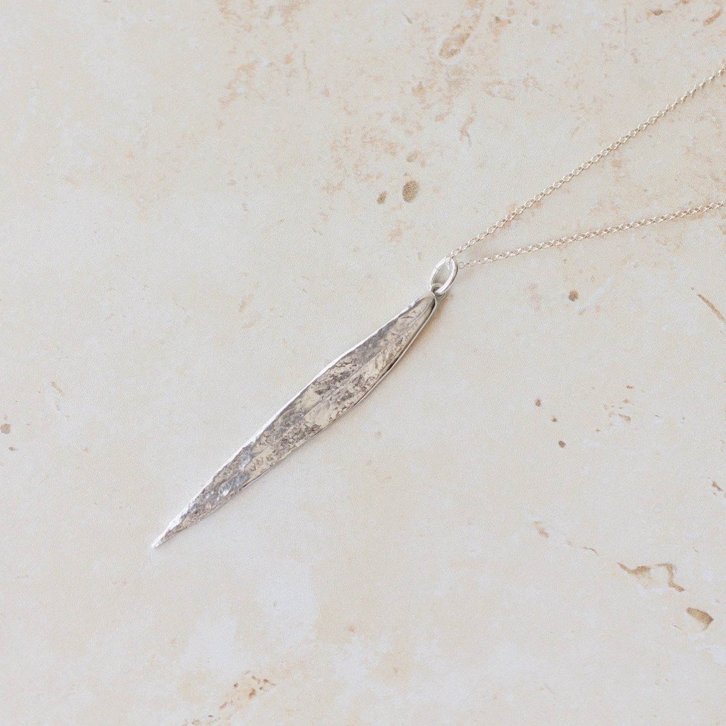 Handcrafted silver willow leaf necklace made in the UK from recycled silver. A nature-inspired pendant with organic texture, perfect for gifting and everyday wear.