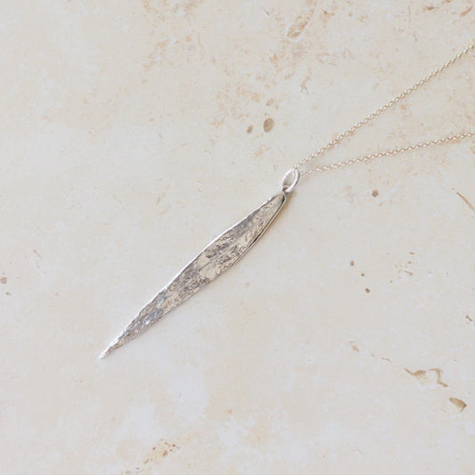 Handcrafted silver willow leaf necklace made in the UK from recycled silver. A nature-inspired pendant with organic texture, perfect for gifting and everyday wear.