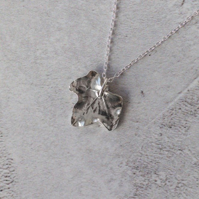 Handcrafted silver ivy leaf necklace on chain, artisan eco friendly botanical jewellery UK